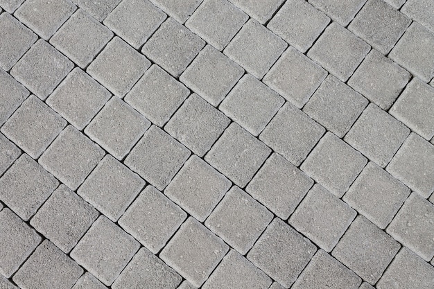 Trottoir En Pierre Naturelle Sous Forme De Tuiles. Fond De Texture Pour Les Concepteurs.