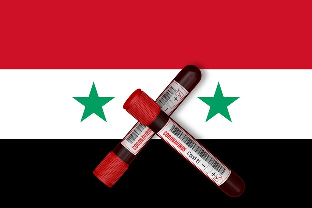 Tubes à essai avec l'inscription 2019-nCoV sur le fond du drapeau de la Syrie. Rendu 3D