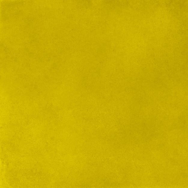 Tuile colorée de fond de surface de texture de mur de stuc jaune vif abstrait