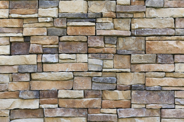 Tuile de pierre abstraite texture fond de mur de brique.