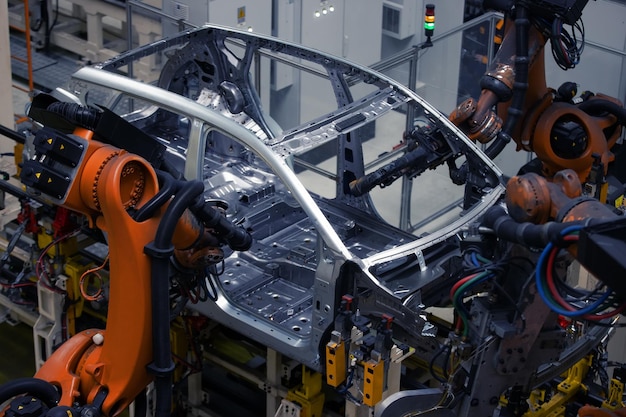 Usine, fabrication automobile, ligne de soudage robotisée innovante