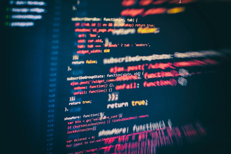 Photo utilisation de css, javascript et html. surveiller le gros plan du code source de la fonction. contexte abstrait de la technologie informatique. code source du logiciel.