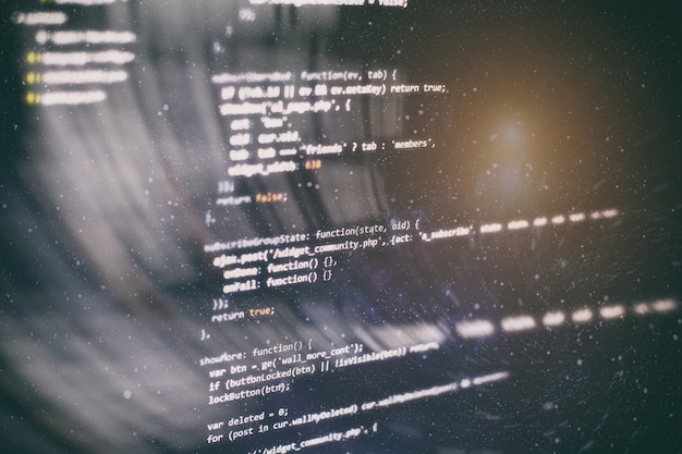 Utilisation de CSS, JavaScript et HTML. Surveiller le gros plan du code source de la fonction. Contexte abstrait de la technologie informatique. Code source du logiciel.