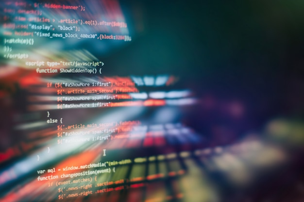 Photo utilisation de css, javascript et html. surveiller le gros plan du code source de la fonction. contexte abstrait de la technologie informatique. code source du logiciel.