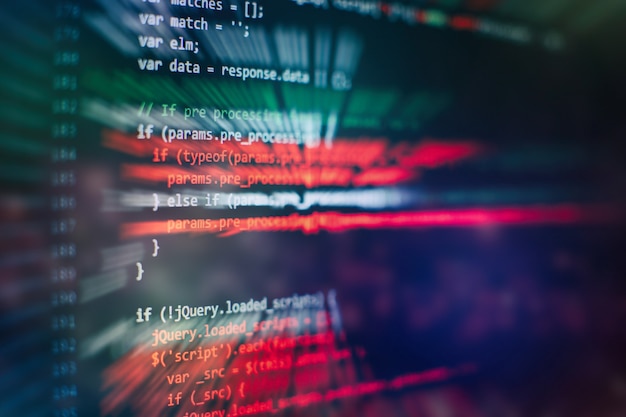 Utilisation de CSS, JavaScript et HTML. Surveiller le gros plan du code source de la fonction. Contexte abstrait de la technologie informatique. Code source du logiciel.