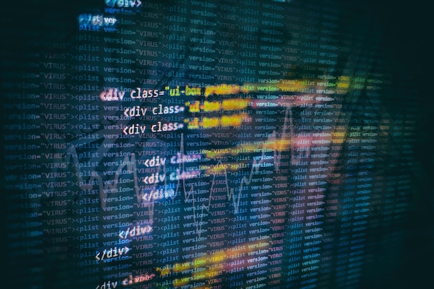 Utilisation de CSS, JavaScript et HTML. Surveiller le gros plan du code source de la fonction. Contexte abstrait de la technologie informatique. Code source du logiciel.