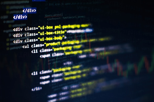 Utilisation de CSS, JavaScript et HTML. Surveiller le gros plan du code source de la fonction. Contexte abstrait de la technologie informatique. Code source du logiciel.