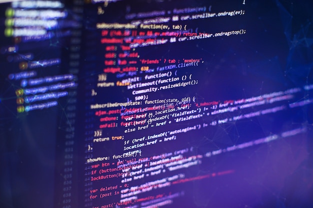 Utilisation de CSS, JavaScript et HTML. Surveiller le gros plan du code source de la fonction. Contexte abstrait de la technologie informatique. Code source du logiciel.