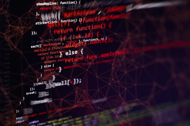 Utilisation de CSS, JavaScript et HTML. Surveiller le gros plan du code source de la fonction. Contexte abstrait de la technologie informatique. Code source du logiciel.