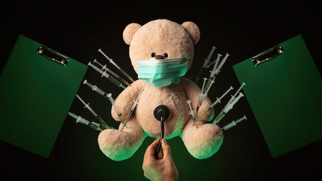 La vaccination des enfants contre le virus covid19 et les vaccinations sur l'exemple d'un ours en peluche