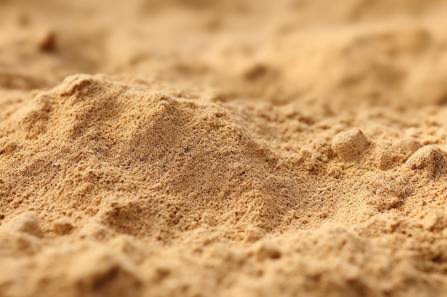 La vague de la mer sur la plage de sable