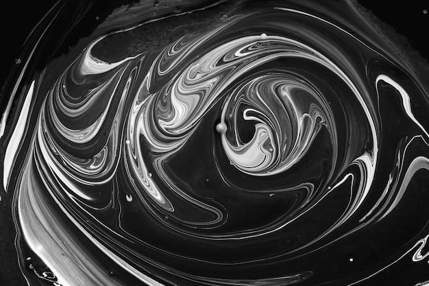 Vagues abstraites blanches et tourbillons sur fond noir. Art fluide. Arrière-plan ou texture de marbre abstrait.