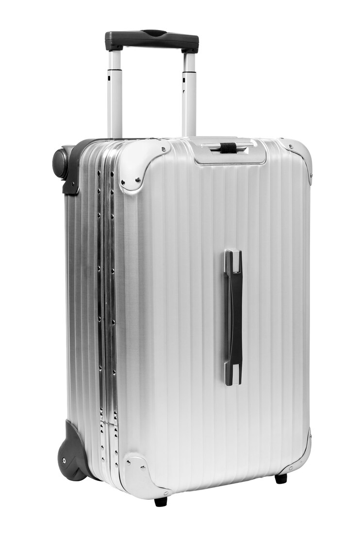 Photo valise d'argent sur isolé sur blanc