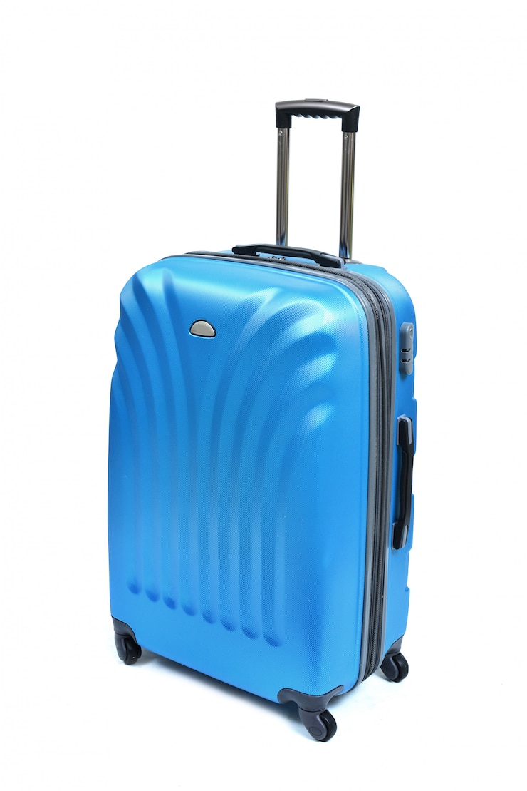 Photo valise bleue isolé sur blanc