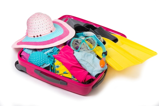 Valise avec des choses en vacances