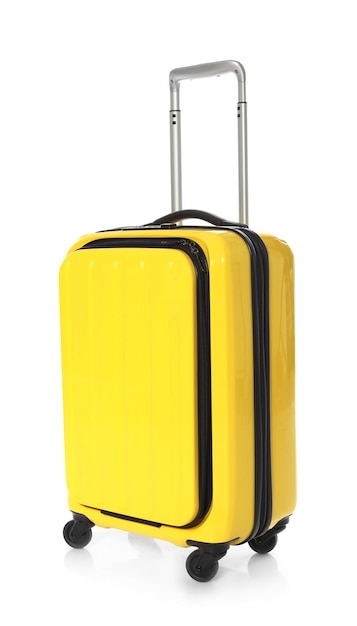 Valise jaune vif sur fond blanc