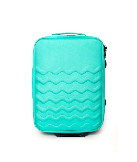 Valise de voyage turquoise vif isolé sur un tracé de détourage blanc