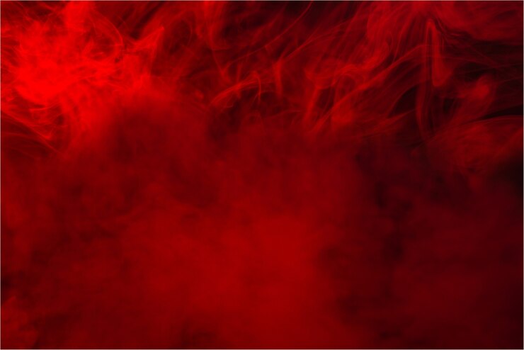 Photo vapeur rouge sur fond noir. espace de copie.