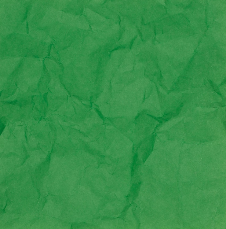 Photo vert de la texture du papier froissé