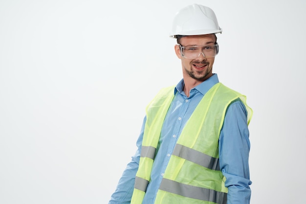 Veste réfléchissante pour homme Arrière-plan lumineux de travail professionnel Photo de haute qualité