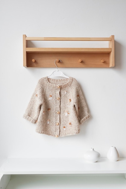 Vêtements tricotés pour bébé Vêtements tricotés à la main avec broderie