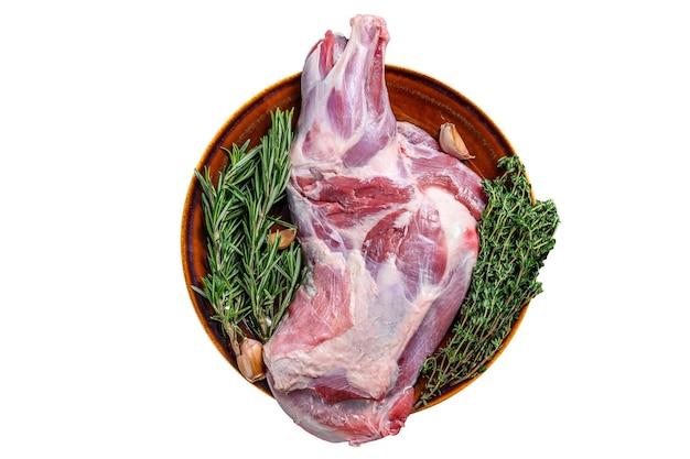 Photo viande d'épaule d'agneau crue fraîche entière sur une plaque isolée sur fond blanc