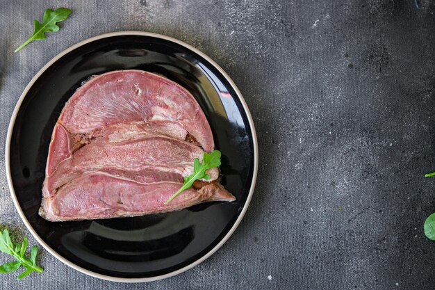 Viande de porc de la langue en gelée Repas frais et sain Régime de collations alimentaires sur la table Espace de copie Aliments