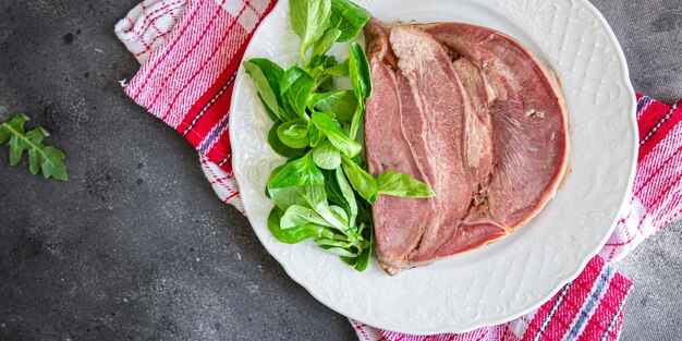 Viande de porc de la langue en gelée Repas frais et sain Régime de collations alimentaires sur la table Espace de copie Aliments