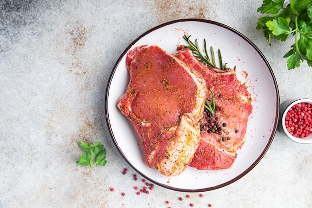 viande steak cru porc boeuf repas frais régime alimentaire collation sur la table copie espace arrière-plan alimentaire