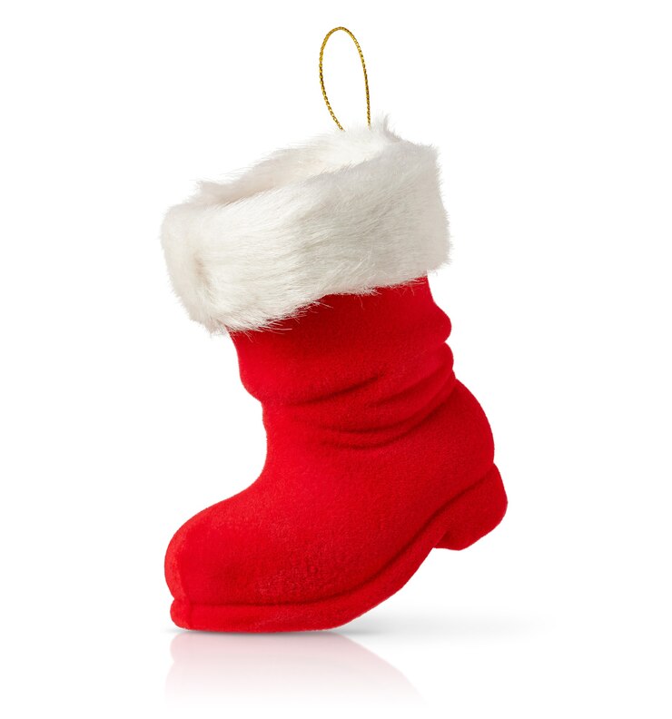 Photo vide santa boot décorations de noël isolés sur fond blanc.