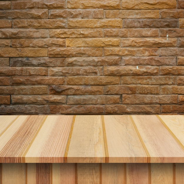 Photo vider les étagères supérieures ou une table sur fond de mur.