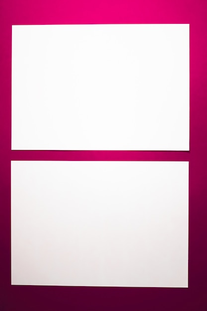 Videz un papier blanc sur fond rose en tant que papeterie de bureau flatlay branding de luxe à plat et soutien-gorge...