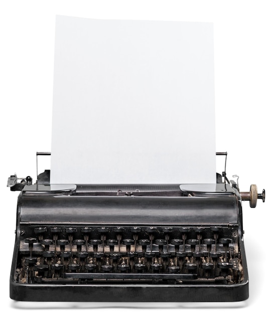 Photo vieille machine à écrire avec du papier sur fond