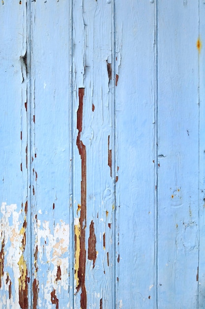 Vieille planche de bois peint fond bleu