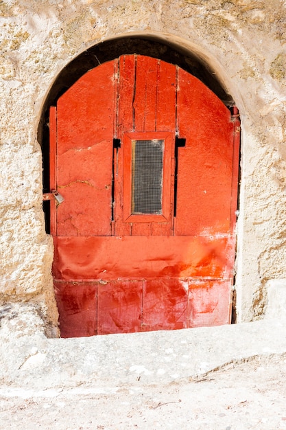 Vieille porte en bois vintage rustique closeup fond porte ornementale détail texture modèle traditionnel