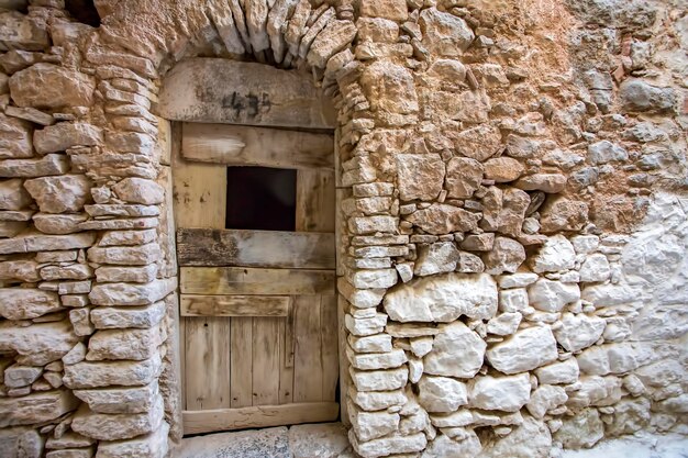 Vieille porte, fond de texture en bois et mur