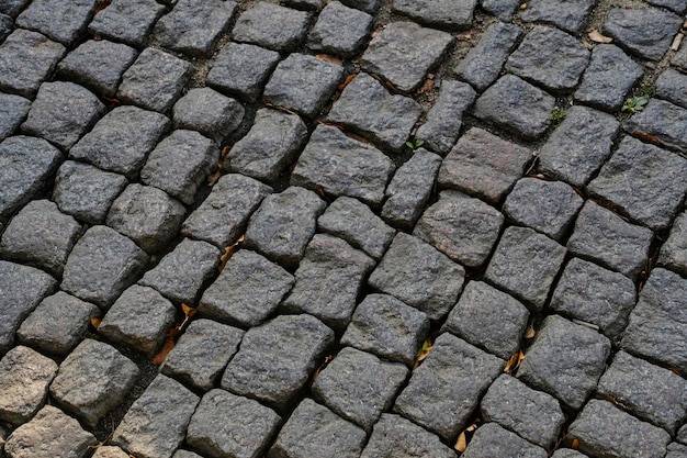 Vieille surface de route de pavés en pierre