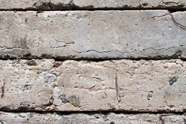 Photo vieux blocs de béton mur fond closeup