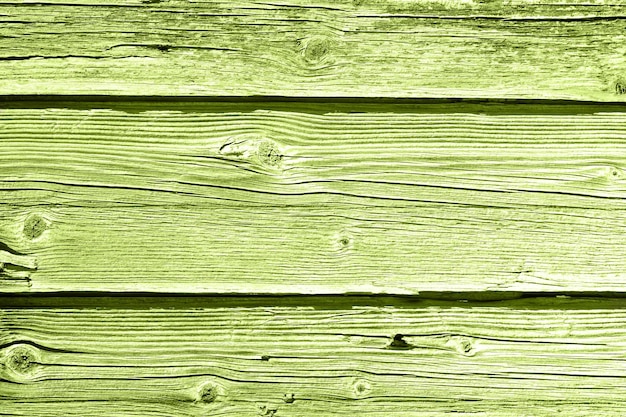 Vieux fond en bois vert ou mur en bois