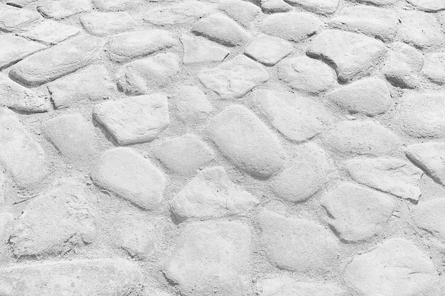 vieux fond de chaussée en pierre / chaussée abstraite, gros pavés, texture de la vieille route