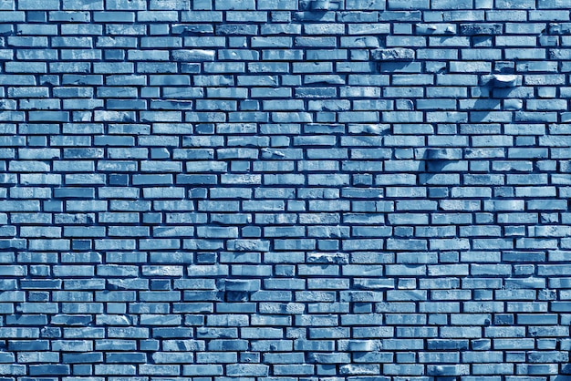 Vieux fond de mur de brique bleue