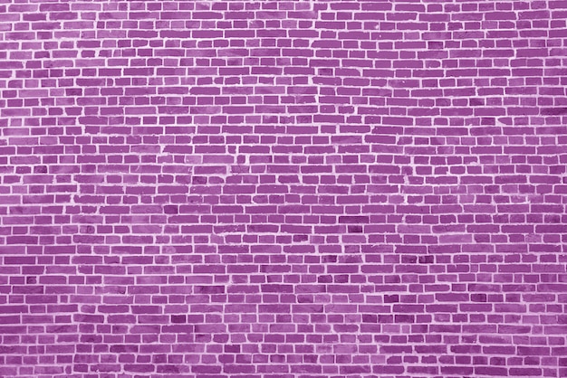 Vieux fond de mur de brique rose