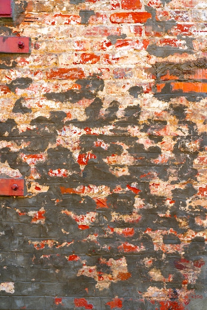 Vieux fond de mur de brique rouge