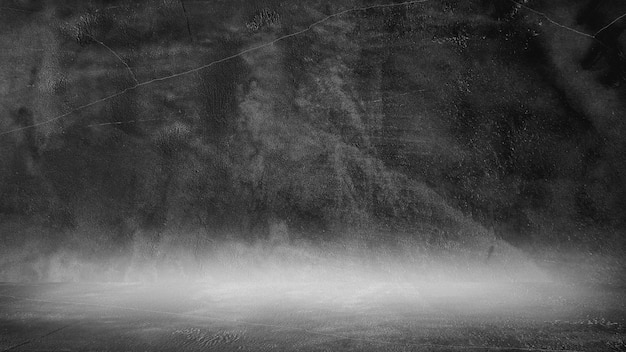 Vieux fond noir. Texture grunge. Fond d'écran sombre. Béton de tableau noir