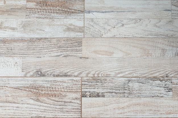 Vieux fond de planche de bois peint beige