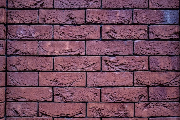 Vieux fond de texture horizontale de mur de brique rouge.