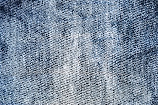 Vieux fond de texture de jeans bleu grunge