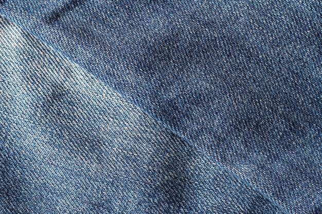 Vieux fond de texture de jeans bleu grunge