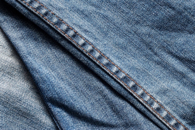 Vieux fond de texture de jeans bleu grunge