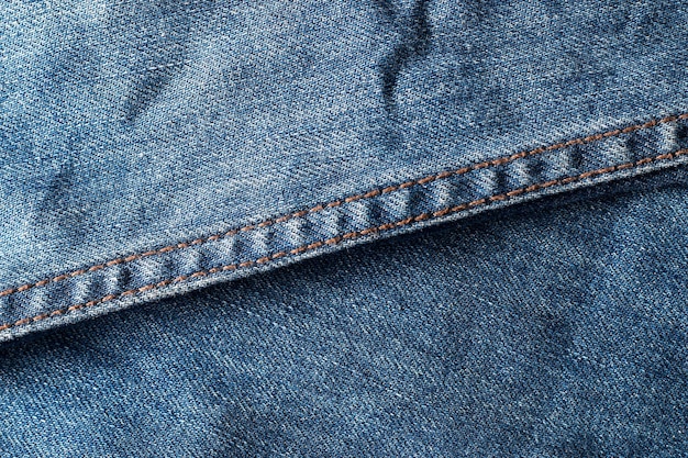 Vieux fond de texture de jeans bleu grunge